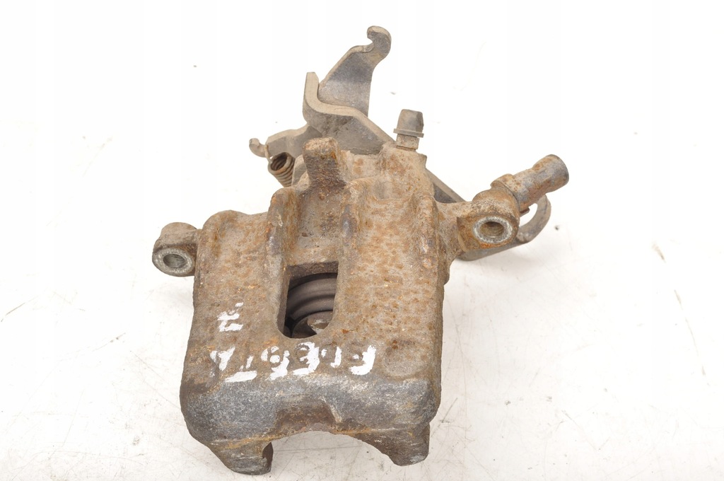 фото №1, Ford fiesta mk7 супорт гальмівний лівий задня