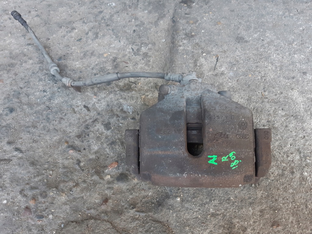 фото №1, Audi a1 8x 1.6 tdi суппорт тормозной правый перед