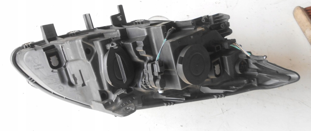 фото №6, Лампа ліва перед renault laguna iii 26060003r