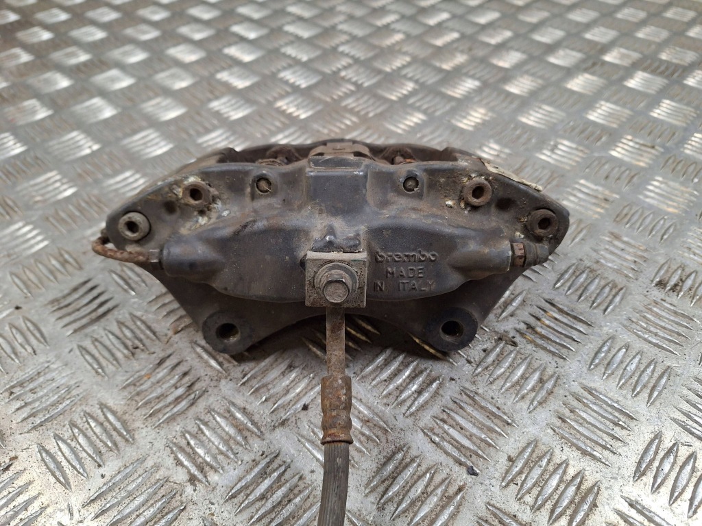 Суппорт тормозной задний задний  сторона левая tesla model s 600643400c Недорого