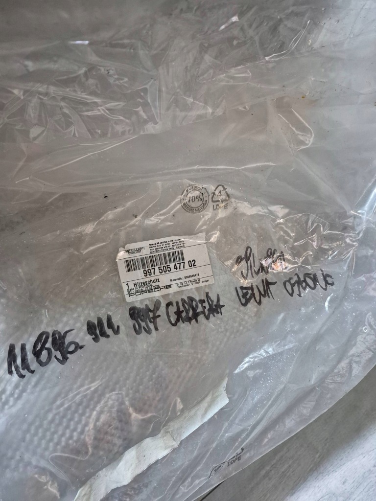 11896. porsche 911 997 carrera ліва накладка теплова двигун 99750547702 Недорого