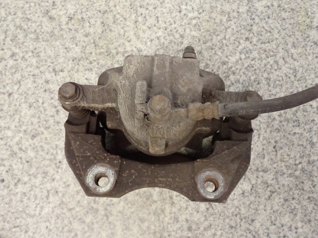 фото №5, Almera n16 00-06 суппорт передний правый