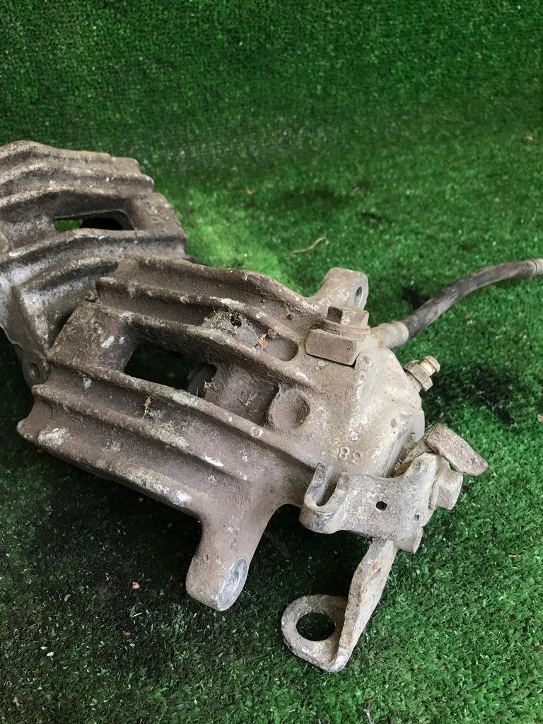 фото №3, Супорт гальмівний задня задній roomster rapid лівий