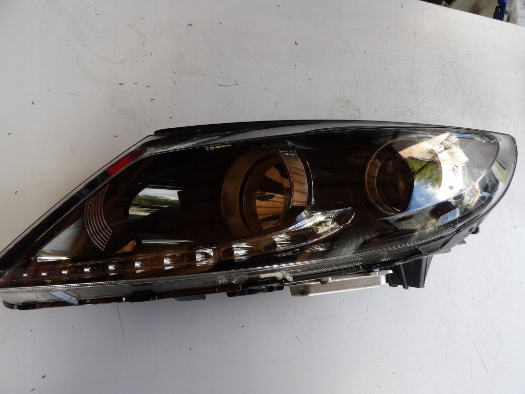 фото №1, Лампа ліва передня kia sportage iii 3