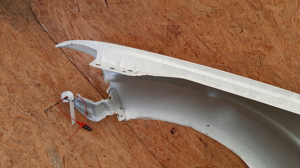 фото №12, Nissan navara d40 iii 2005- крыло правый перед оригинальный zdrowy