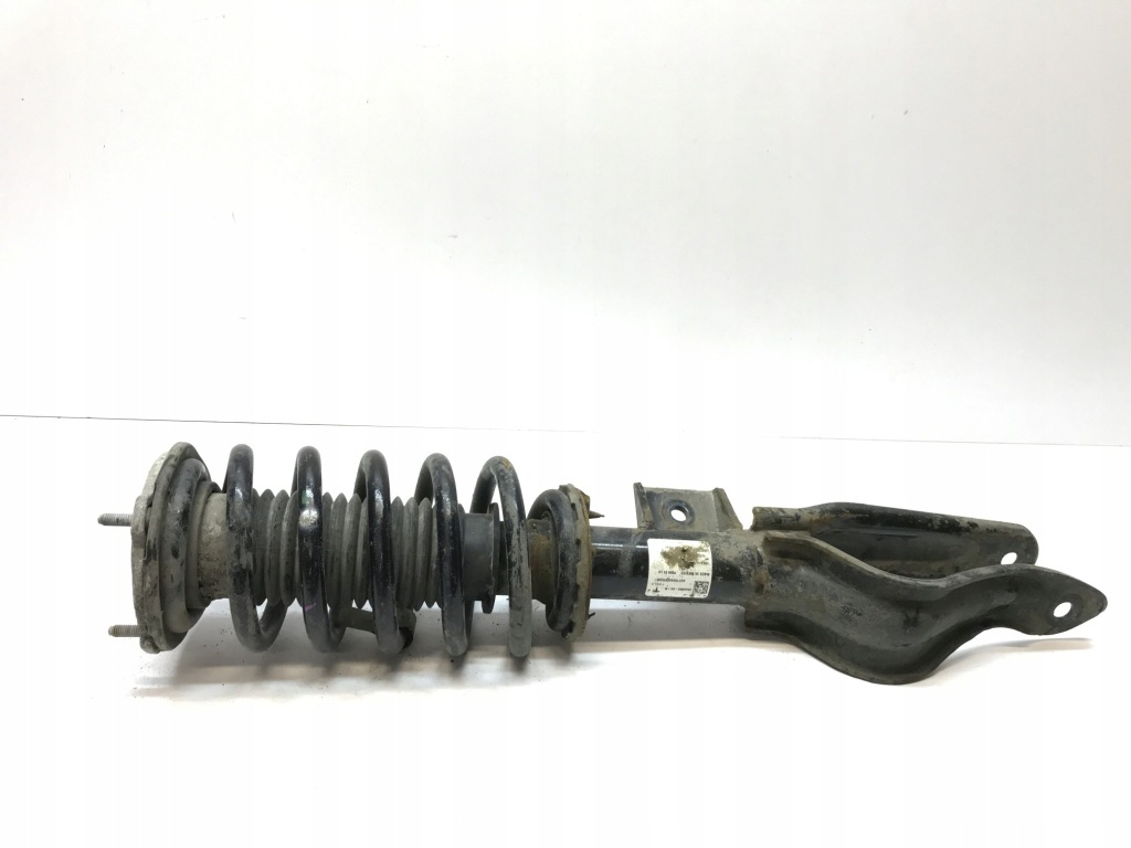 Купить Tesla model 3 амортизатор передний левый 1044363-04-b