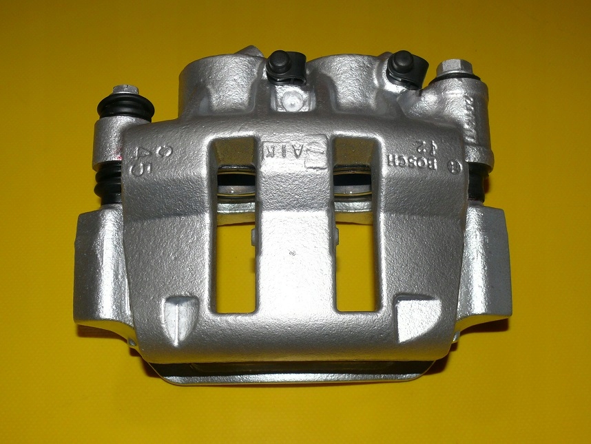 фото №1, Суппорт левый перед renault master ii 305,50/28 97-