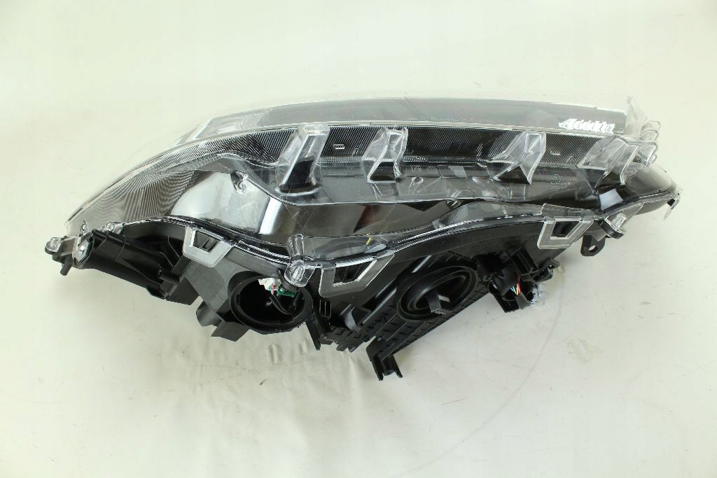 фото №10, Лампа права фара toyota rav4 v перед 19-