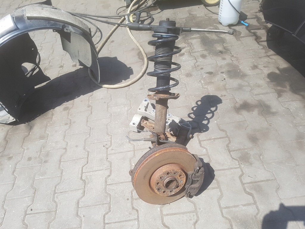 фото №1, Vw eos 06-10r 2.0 tfsi амортизатор поворотный кулак правая