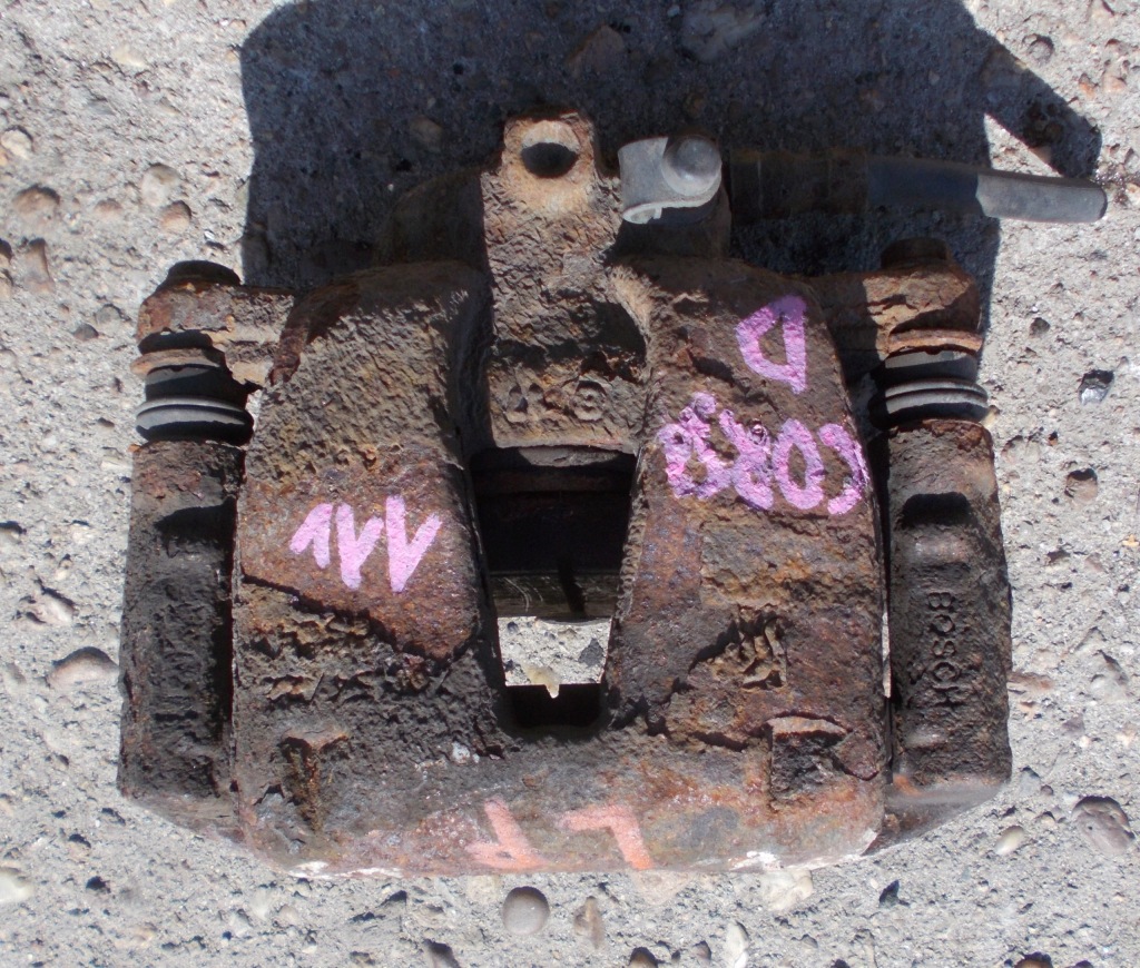 фото №1, Opel corsa d 1.4 11r супорт гальмівний лівий перед