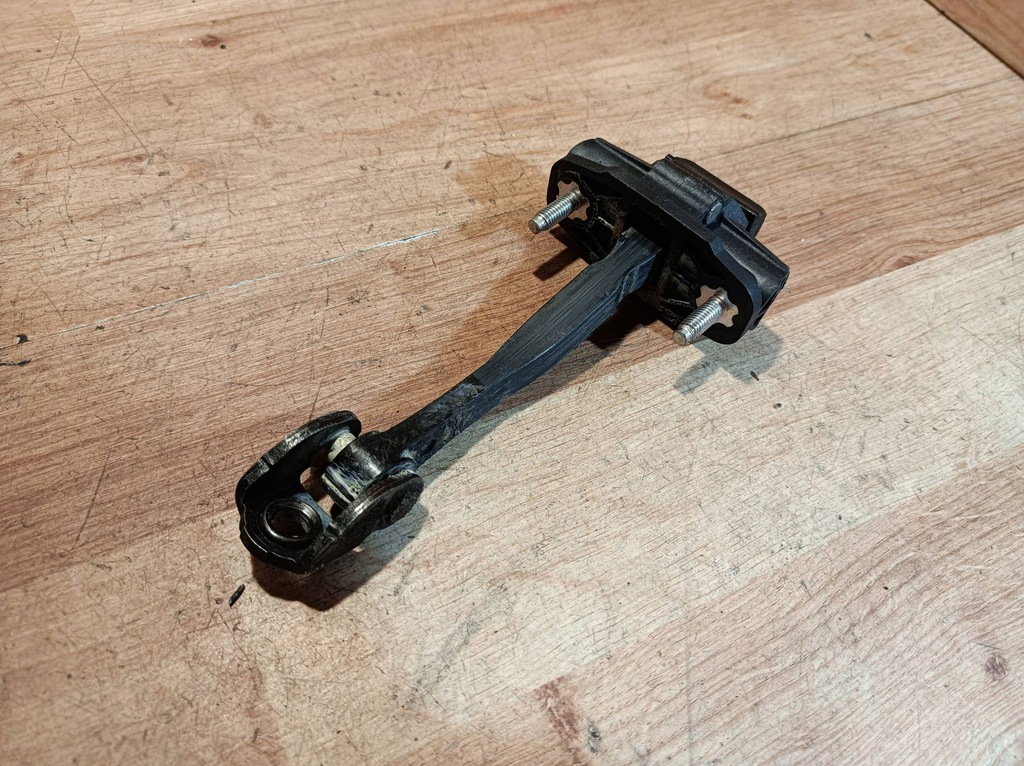 фото №7, Обмежувач двері задніх лівий volvo v40