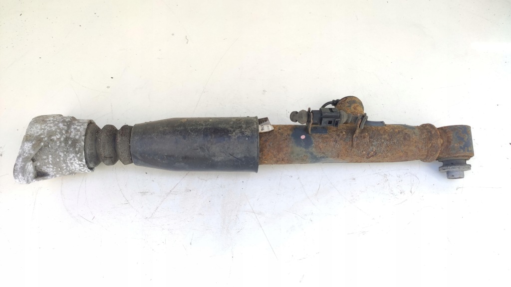 фото №1, Audi a6 c6 амортизатор лівий задня 4f0616031j