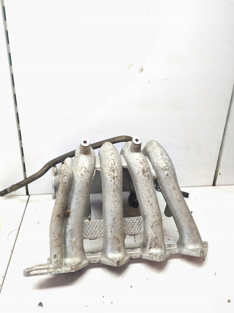 Купить Коллектор впускной  1.6 16v colt v 96-04 carisma