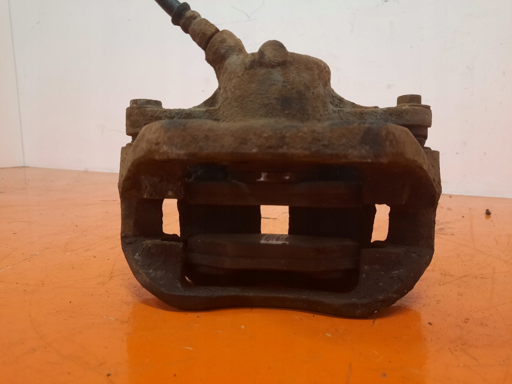 фото №4, Nissan kubistar i 1.5dci 88km 03-08 суппорт тормозной перед левый 201645 k9k