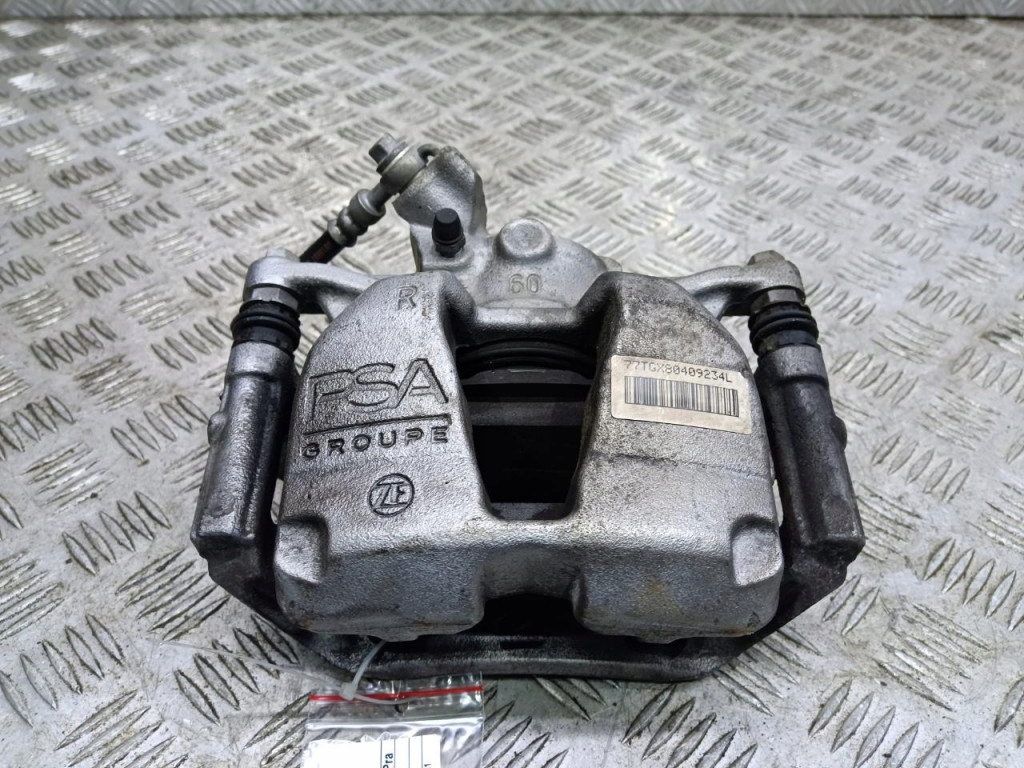 фото №1, Opel astra l 1.2 thp суппорт тормозной перед правый ---