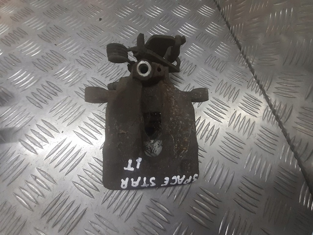 фото №1, Супорт гальмівний лівий задня mitsubishi space star 1.6