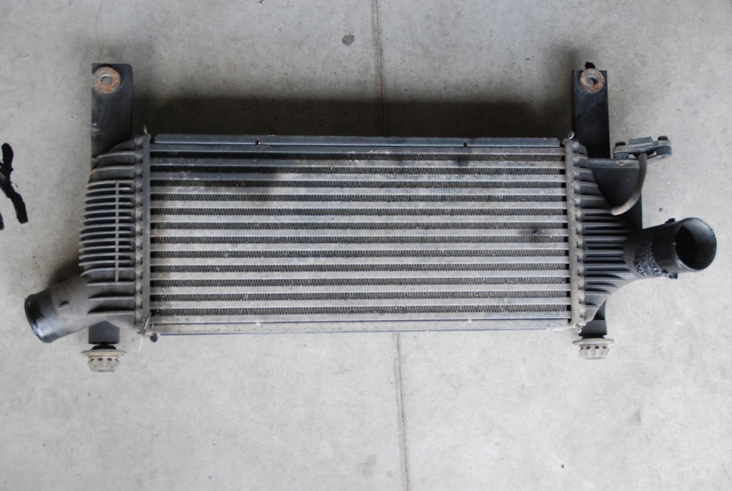 фото №1, Nissan navara d40 08r 2.5 dci интеркулер