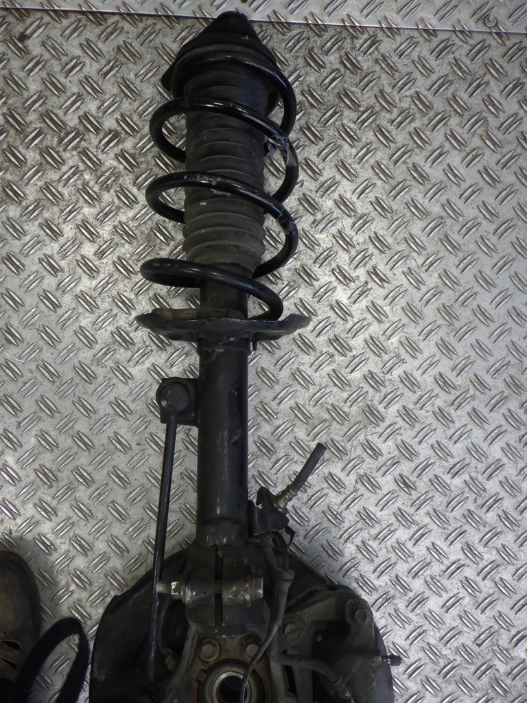 фото №7, Амортизационная стойка поворотный кулак левый перед koleos ii