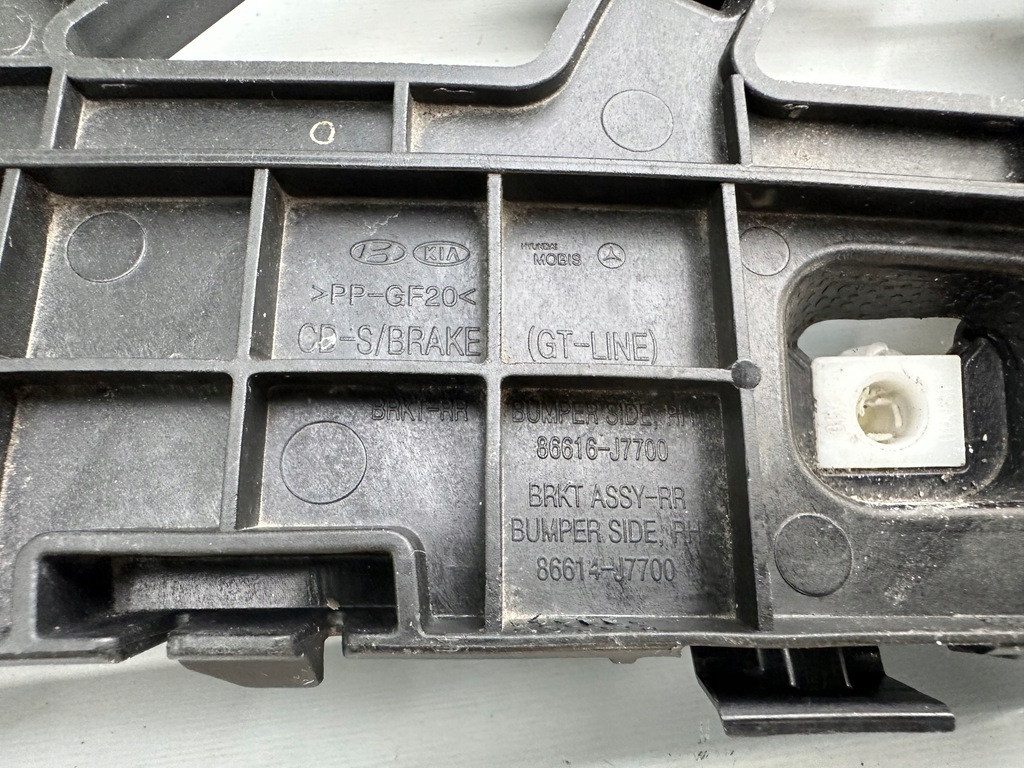 фото №8, Kia оригинальный номер 86614-j7700 кронштейн направляющая