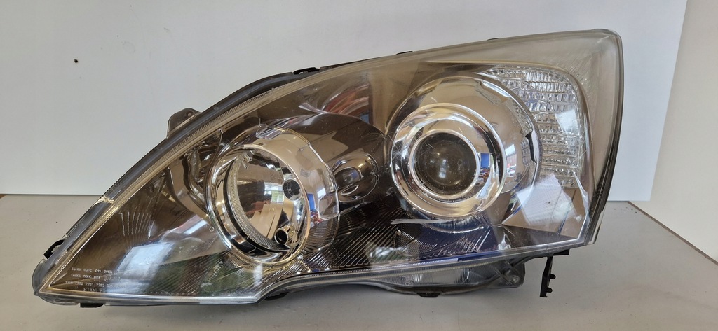 фото №1, Лампа передняя левая honda crv 2006- ксенон orginał