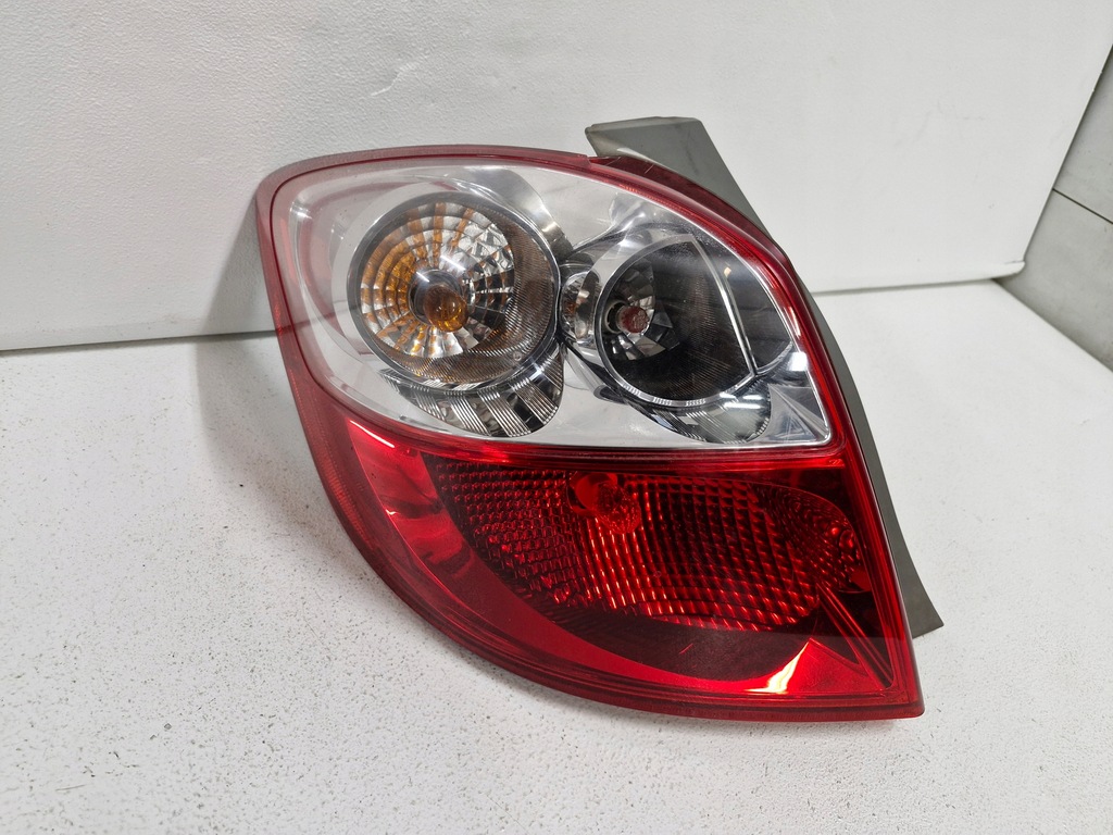 фото №1, Toyota matrix ii 2 e140 лампа лівий задня задня оригінальний номер