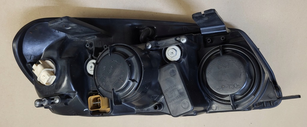 фото №11, Лампа фара левая перед chevrolet captiva i оригинальный номер europa