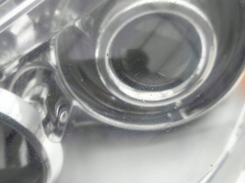 фото №13, Chrysler grand voyager v 2009 ліва сторона лампа передня