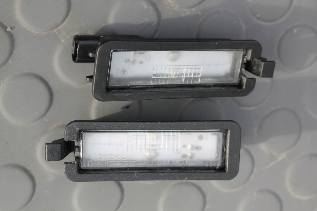 фото №1, Лампа номерного знака освітлення 68276972aa chrysler pacifica 16-
