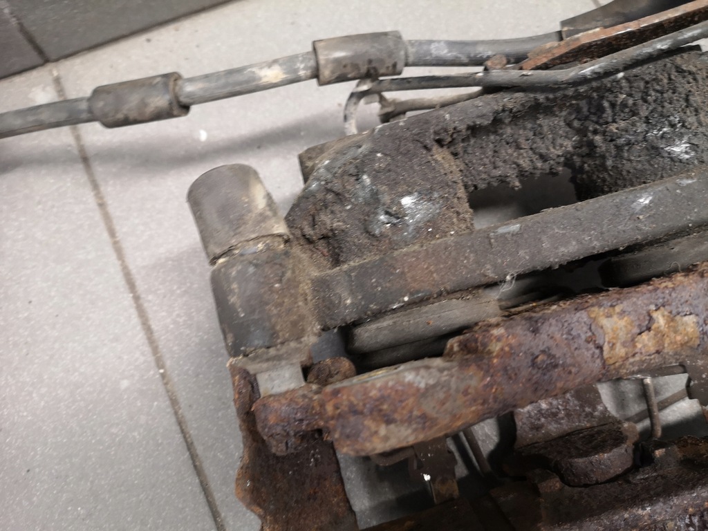 фото №8, Суппорт тормозной левый перед audi a8 d2 4.2 lift