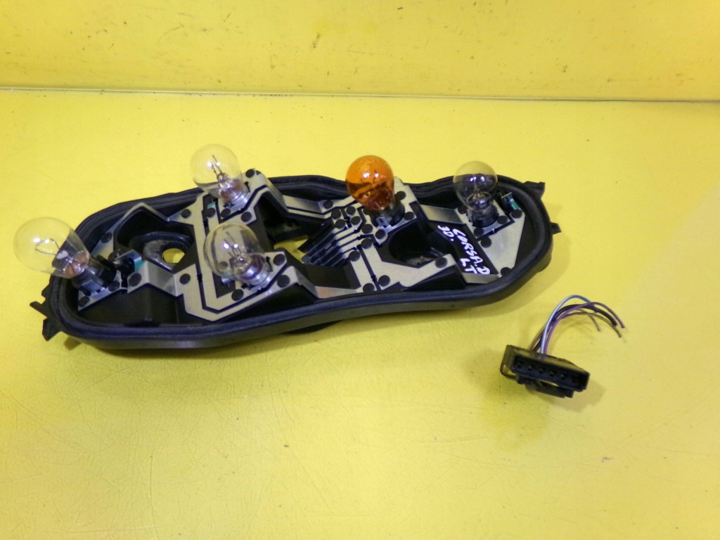 Вкладиш лампи задній лівий задній opel corsa d 89037853a nr450 Недорого