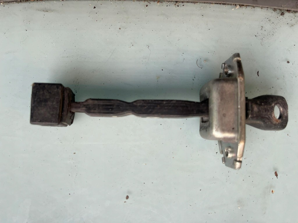 фото №1, Ограничитель дверь перед outlander