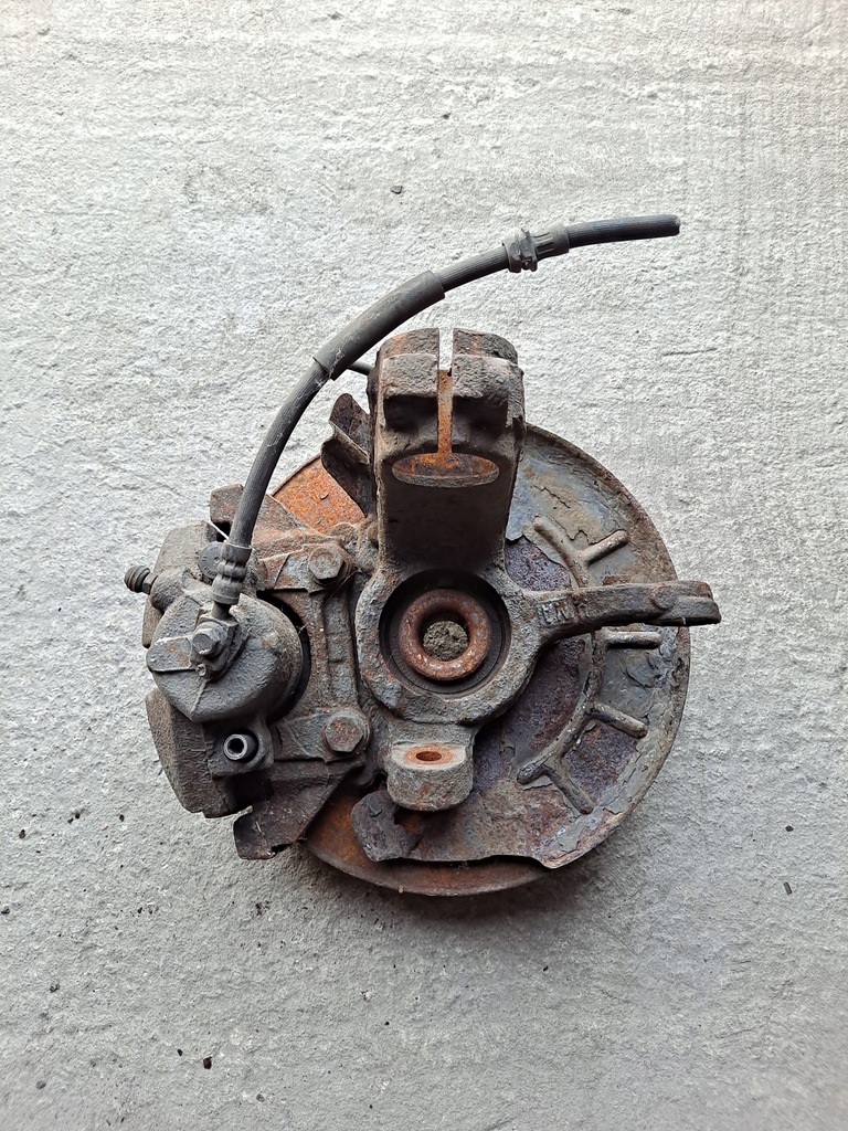 фото №2, Поворотный кулак суппорт правый перед skoda rapid 1.6 tdi