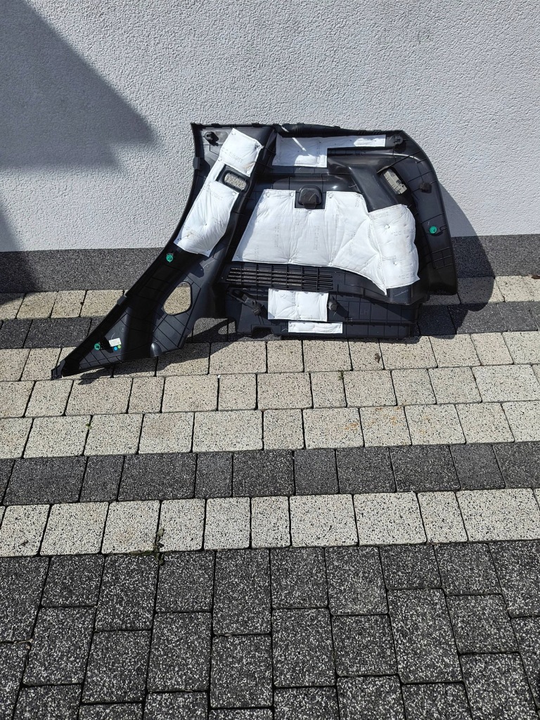 Обивка боковая багажника задний  сторона левая hyundai kona 1 85731-dd100 Недорого