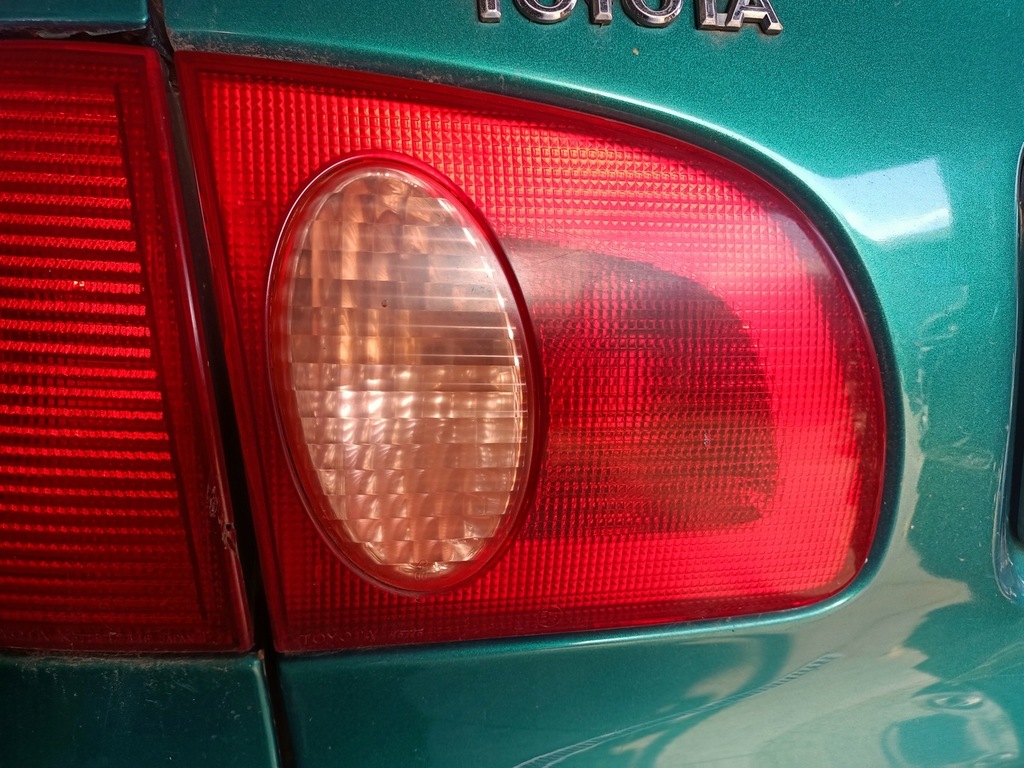 фото №1, Лампа ліва задня кришки toyota corolla e11 sedan