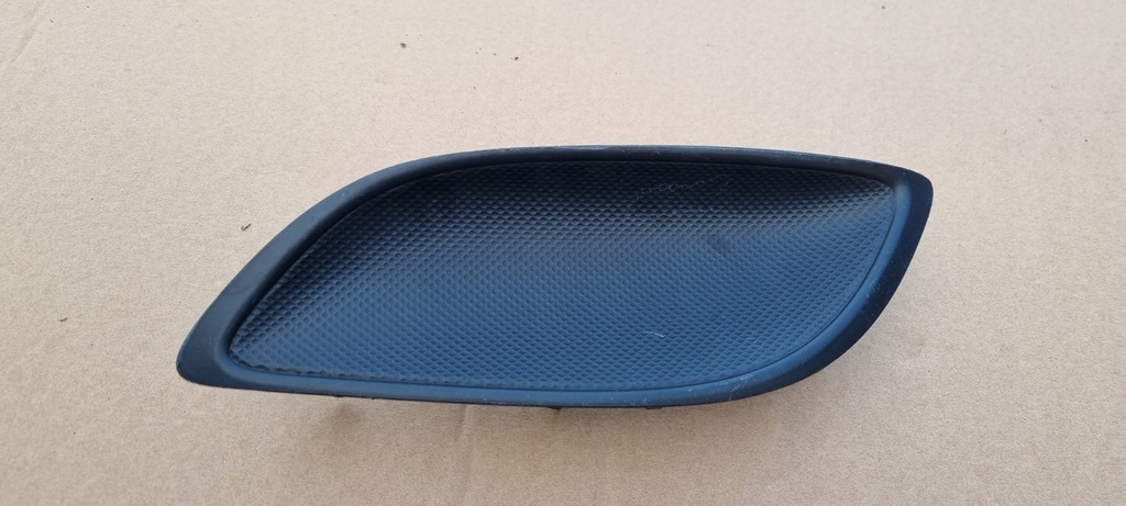 фото №1, Toyota yaris ii lift 2009- решётка левая бампер перед оригинал