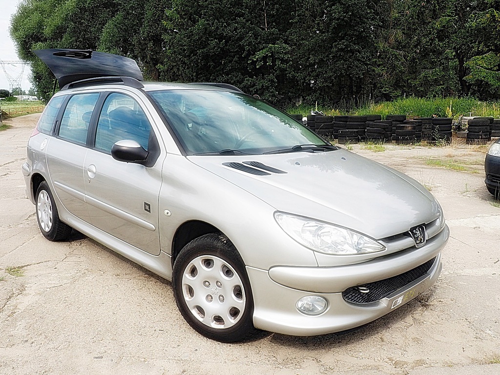 фото №8, Peugeot 206 обшивка обивка дверь левый перед ładn