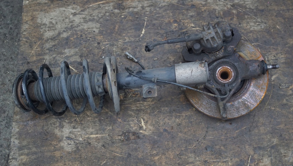 фото №7, Поворотний кулак амортизатор лівий перед peugeot partner iii 1.6 hdi