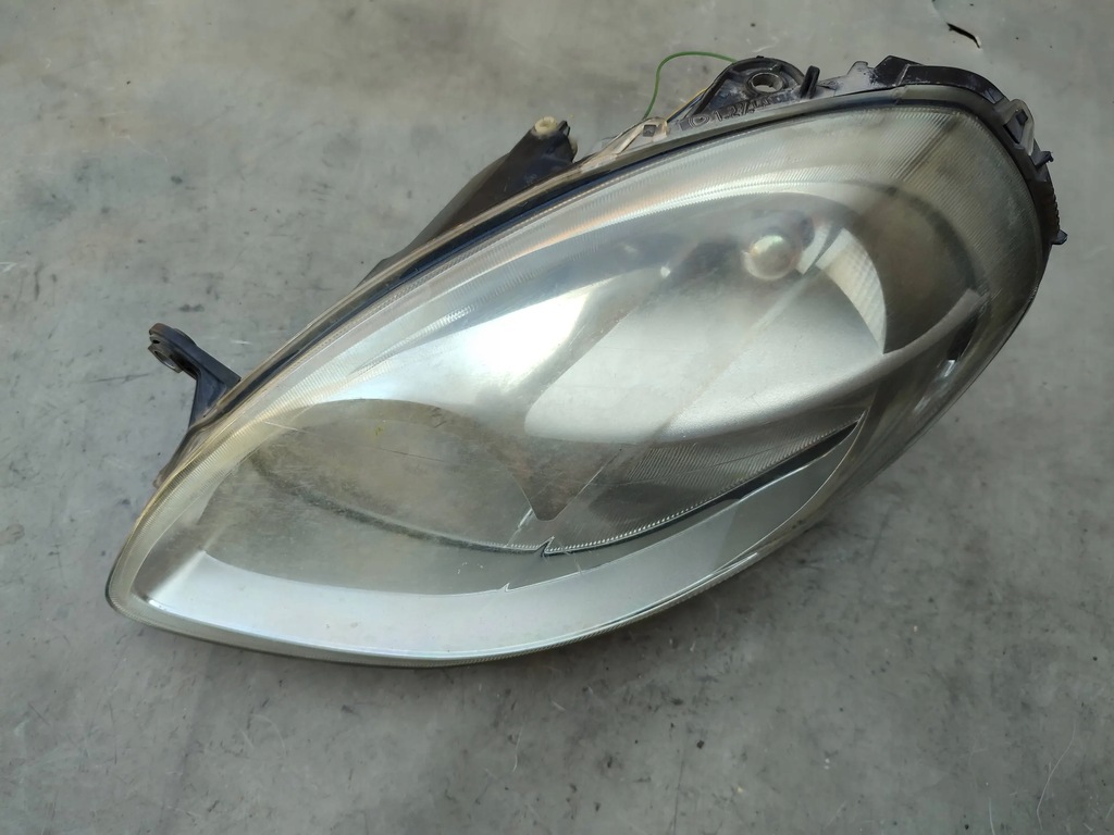 фото №1, Фара лампа лівий перед musa 2007 fl lift