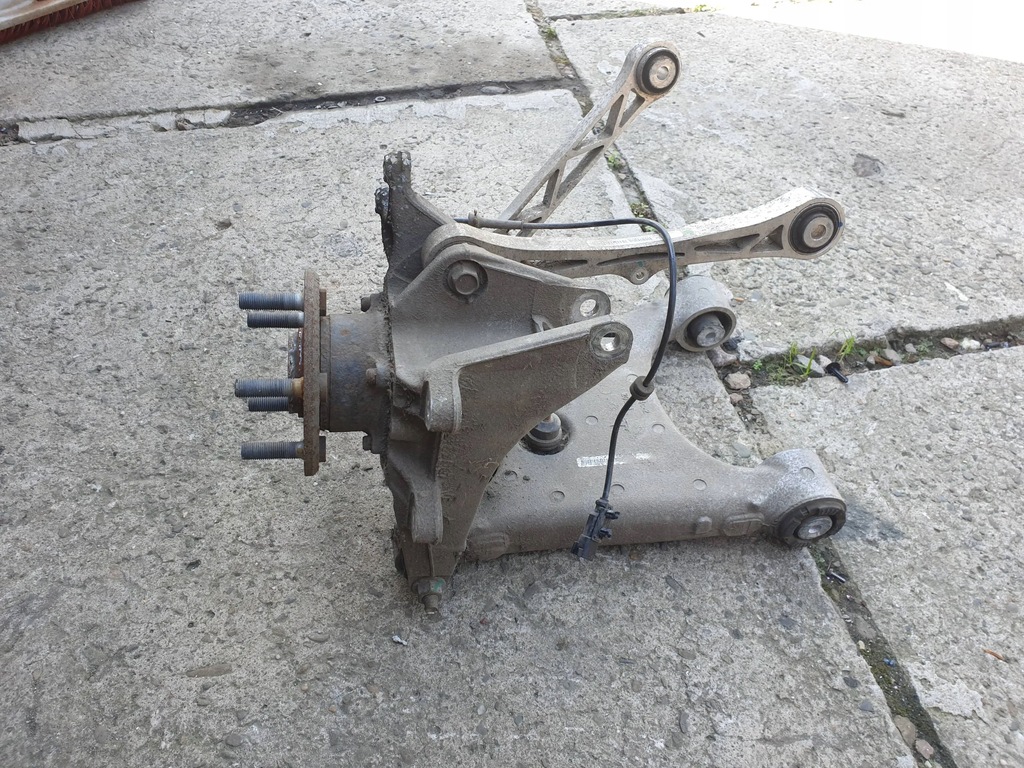 фото №1, Tesla s поворотный кулак рычаг левый задняя