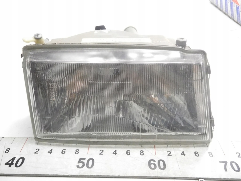 Фара правий перед fiat uno оригінальний номер 7642685 Ціна