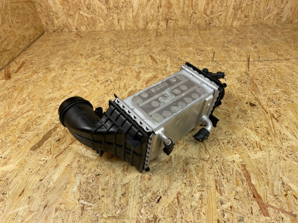 Радиатор воздуха интеркулер vw skoda seat audi 04e145785s Цена