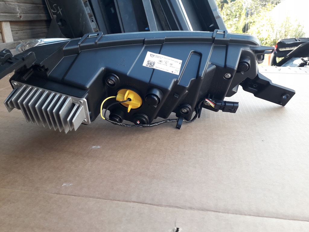 фото №6, Лампа передняя левая dacia spring led drl