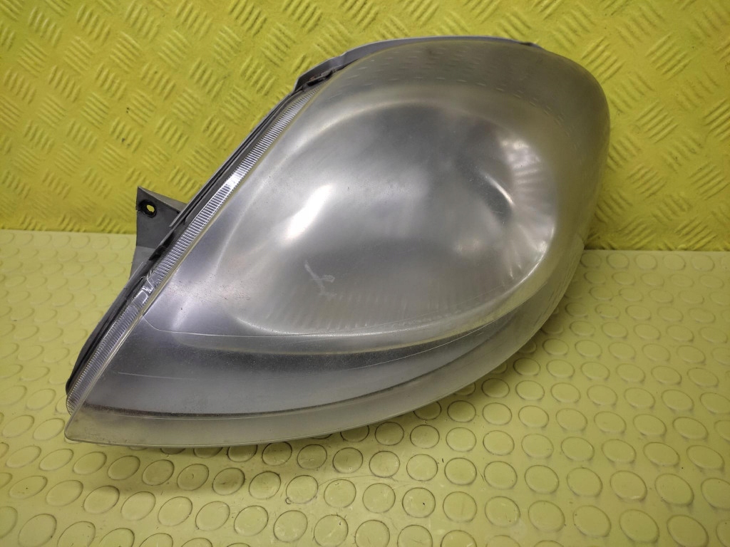 фото №1, Opel vivaro фара лампа левый перед 7700311371