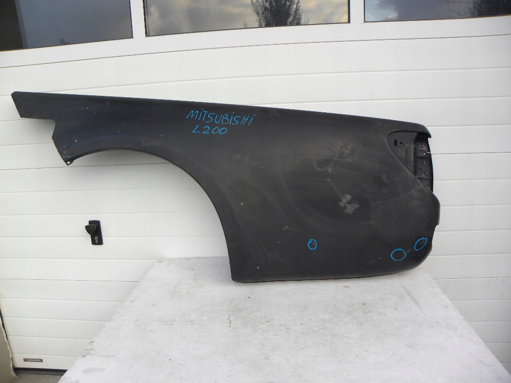 фото №1, Mitsubishi l200 крыло задний левая сторона