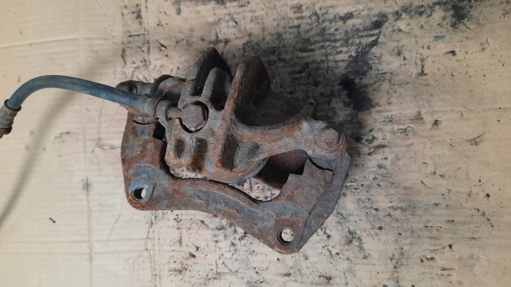 фото №5, Супорт гальмівний лівий перед volvo v40 s40