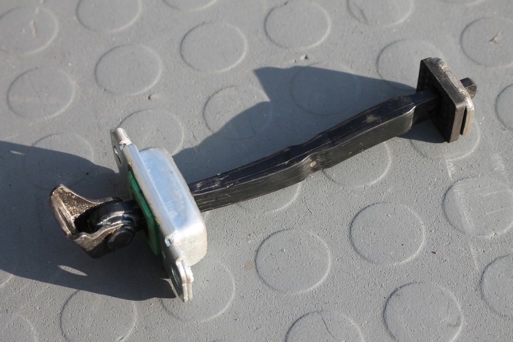 фото №4, Обмежувач двері лівий перед santa fe ii 06-12