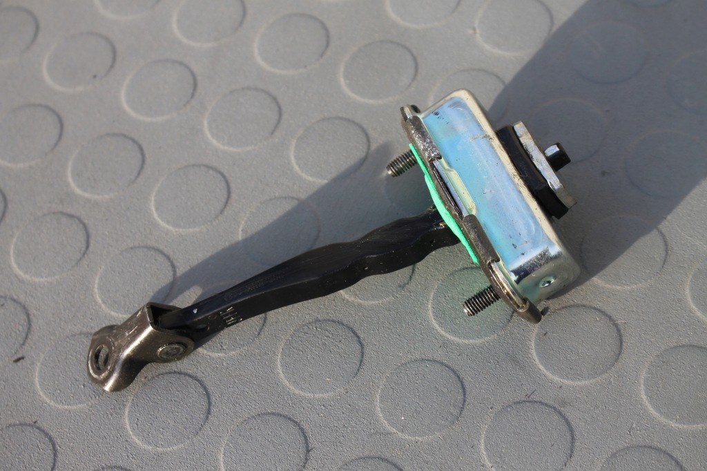 фото №1, Обмежувач двері лівий перед kia optima iv 15-20