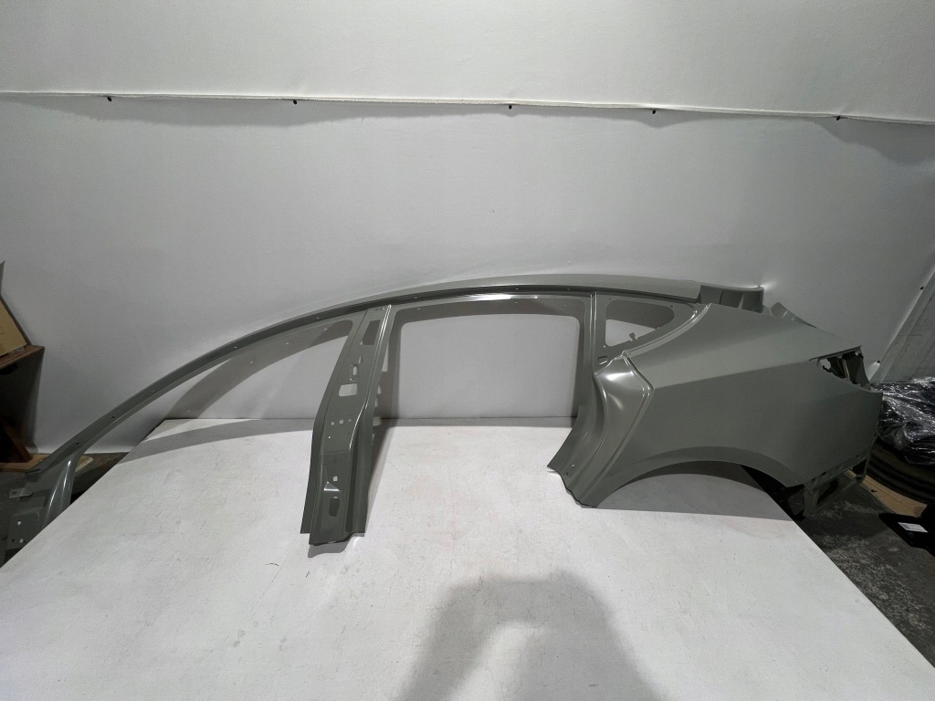 фото №1, Tesla model 3 lift nv 35 nv35 24-25 задний задняя крыло левый новый org!!!!!