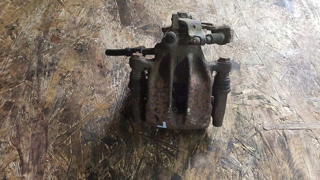 фото №1, Супорт лівий задня galaxy mk1 2.8 vr6