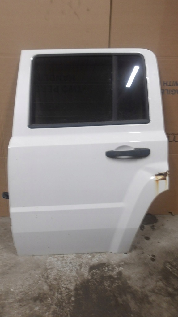 фото №1, Дверь левая задние jeep patriot 08' europa